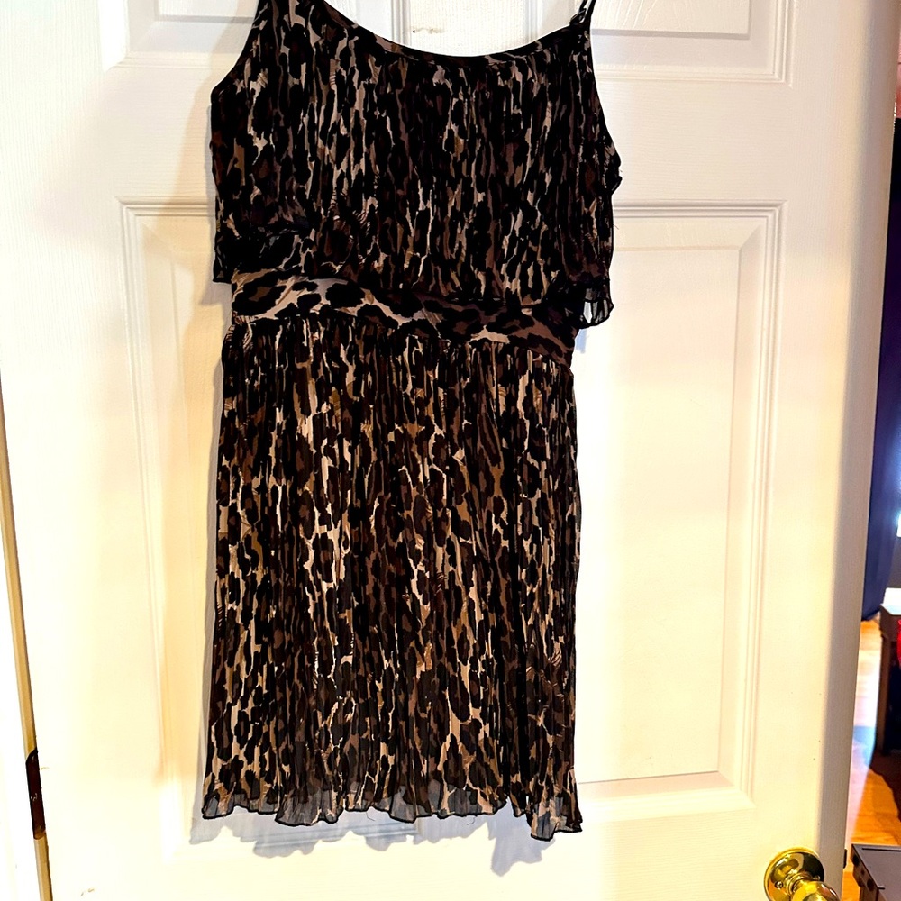 Cutest Leopard print romper. You will not be disappointed with this one.